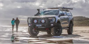 Next Gen Ford Ranger with RT Pro wheels on the beach at the water's edge