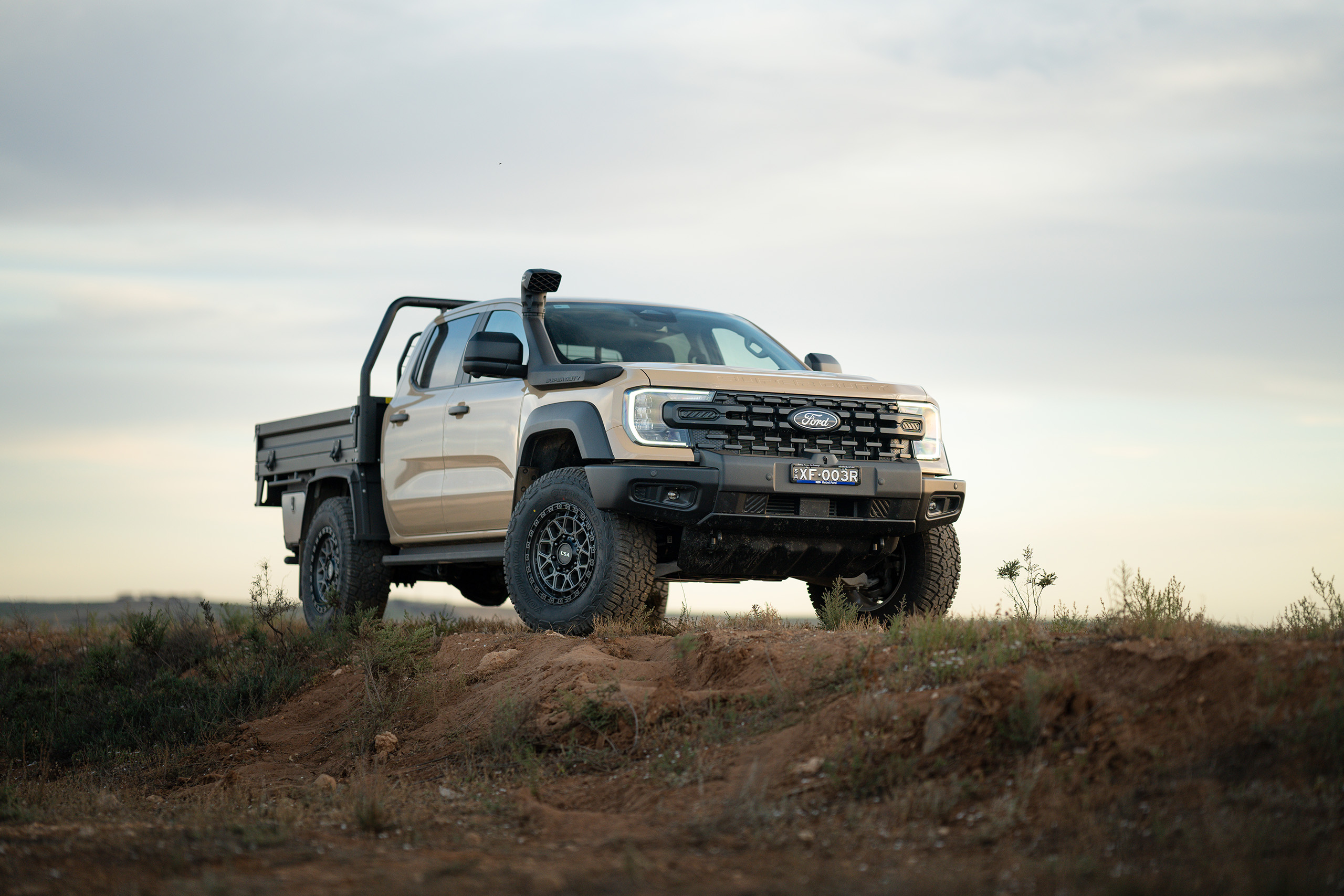 CSA Thunder HD satin graphite wheels on sandy Ford Ranger Super-Duty on dirt gravel road